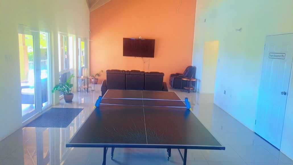 Clubhouse games room with table tennis