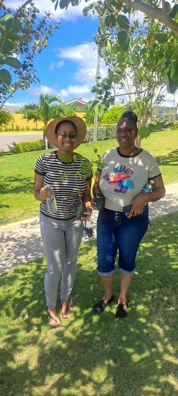 Two residents smiling on the lawn